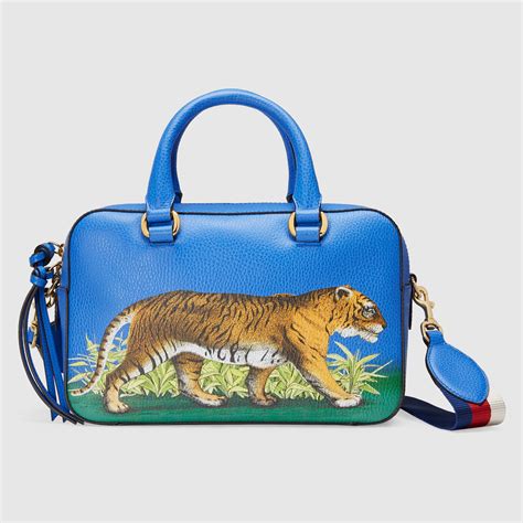 gucci blue suede handbag|gucci bag with tiger head.